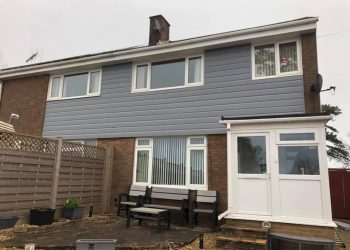 Replacing tile cladding with grey PVC cladding
